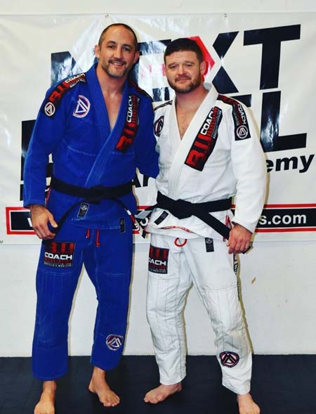 Edward Bean Receiving Brazilian Jiu JItsu BlackBelt